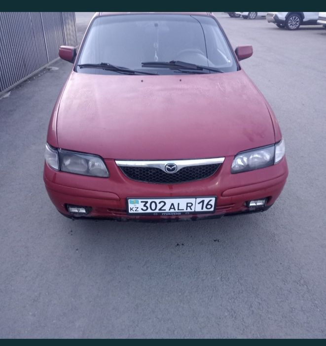 Автомобиль Мазда 626