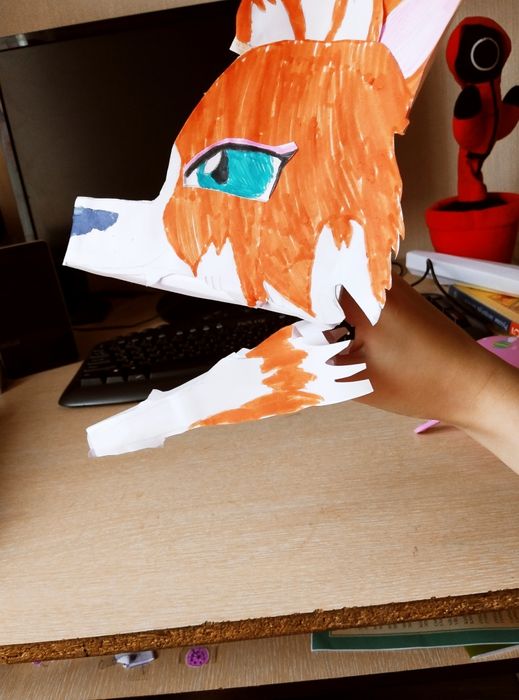 Самодельная оранжевая собачка