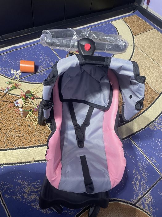 Игрушечная коляска