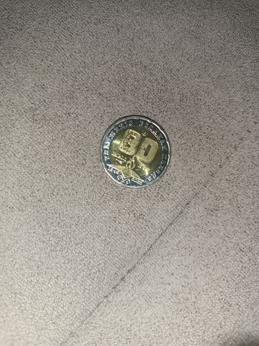 Монета колекционная 200тг 80 летие