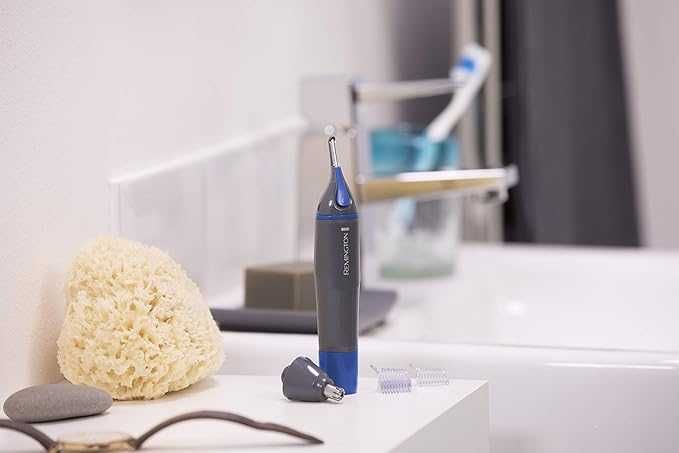 Тример за подстригване Remington Nano Series NE385 , за нос и уши с 2 глави