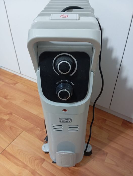 Calorifer electric cu ulei Star-Light YOH9  2000 W  9 elementi 145 x 582 mm, 5 canale ulei, 3 trepte de putere, Termostat reglabil, Indicator luminos