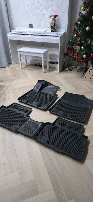 Продам резиновые автоковрики