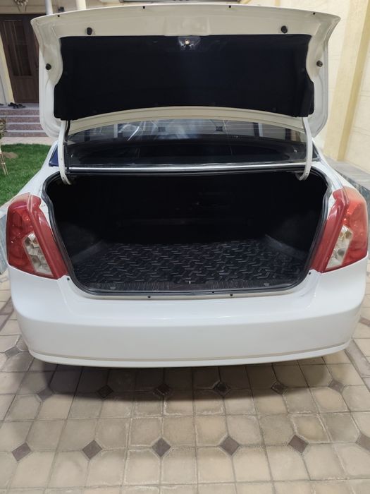 Lacetti 1.8 бир қўл мошина