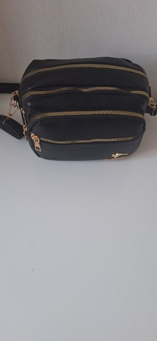 Продам Сумку новую  с ремешком