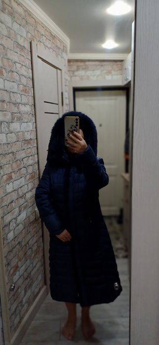 Продам женский пуховик
