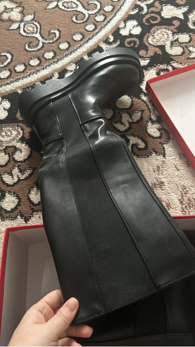 Продам сапоги новые