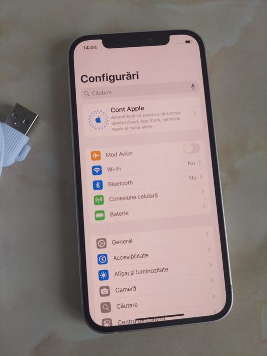 Vând Apple iPhone 12 alb [spart pe spate și cască defectă] /poze reale