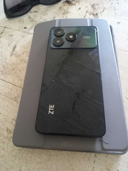 Продам телефон zte a38
