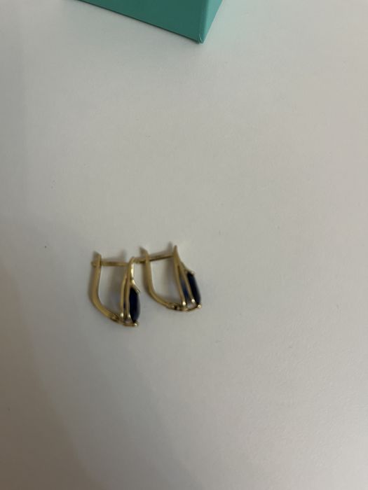 Продам золотые серьги