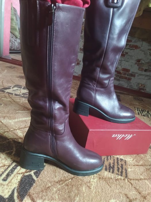 Продам новые сапоги