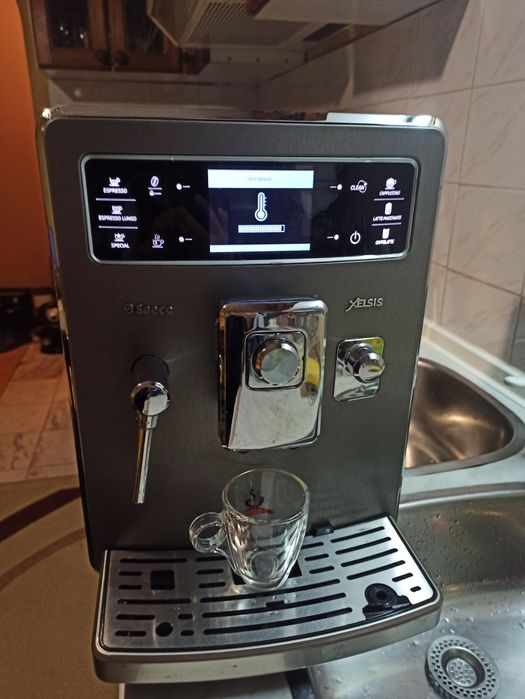 Кафе автомат Саеко Хелсис перфектен декалциран сменени клапани и уплат