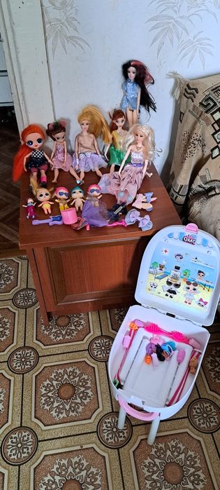 Наборы кукол с рюгзачком.