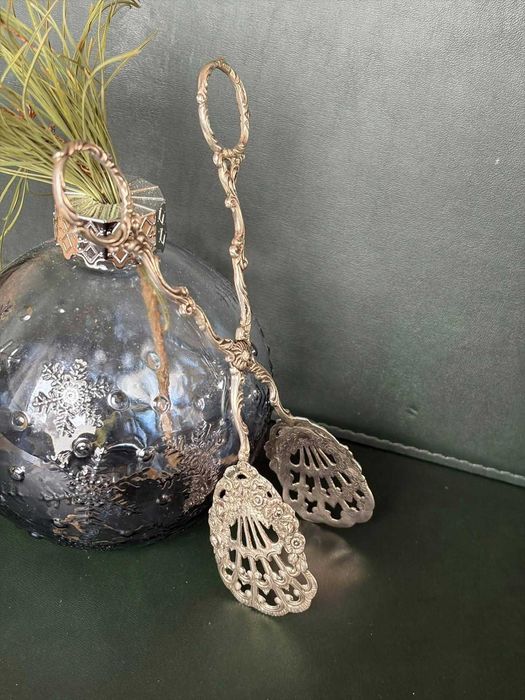 Clește vechi din argint,