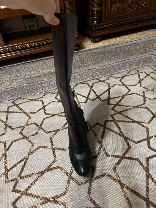 Продам женскте сапоги