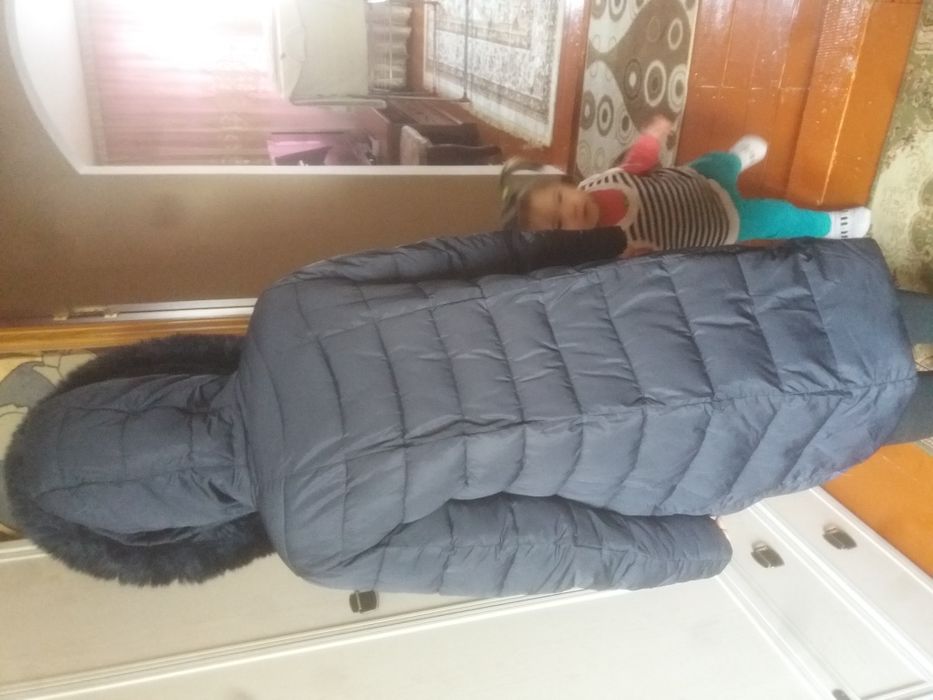 Пуховик женский .