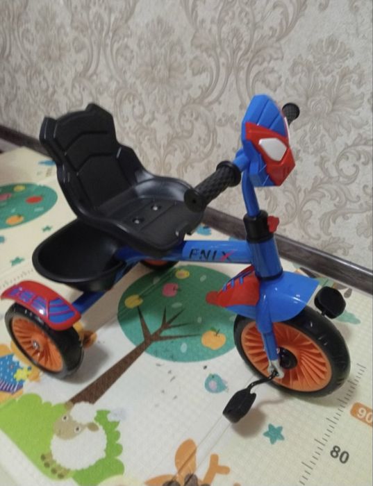 Трёхколёсный велосипед