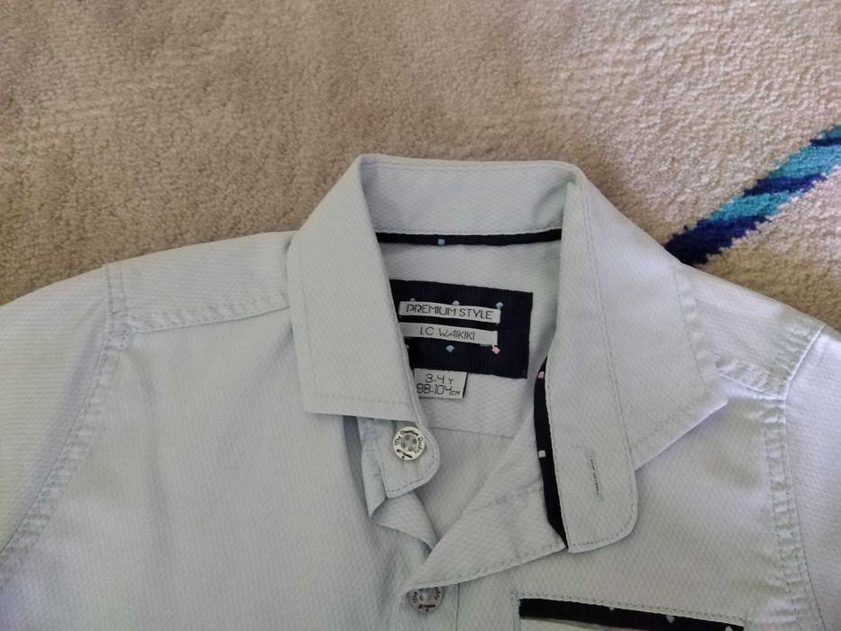 Ризи за момче,синята е размер 104 за 3 г., червената е 120см за 6-7 г.