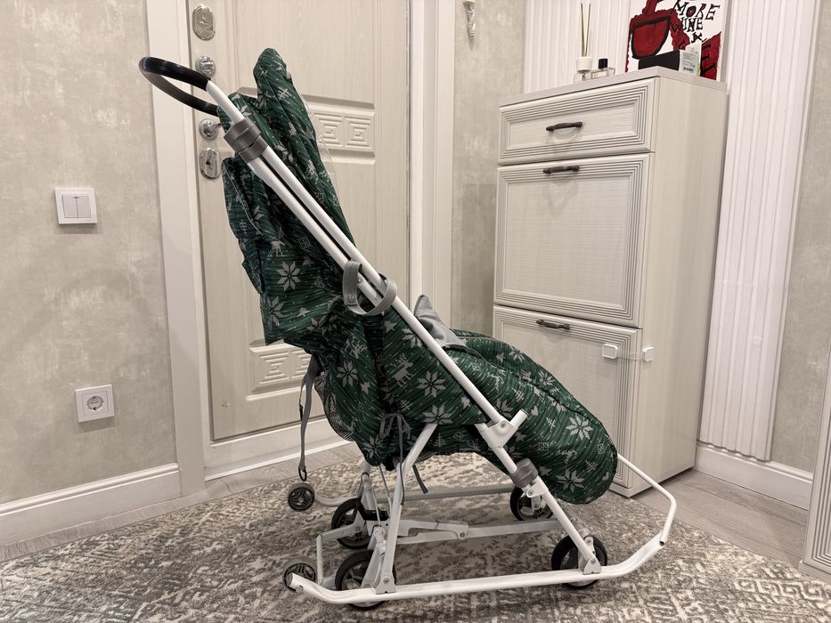 Продам б/у санки-коляску