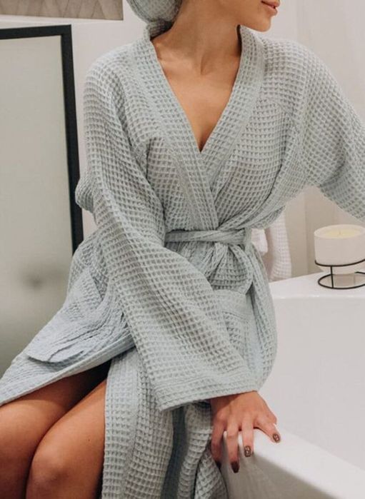 Полотенце и банные халаты для гостиницы