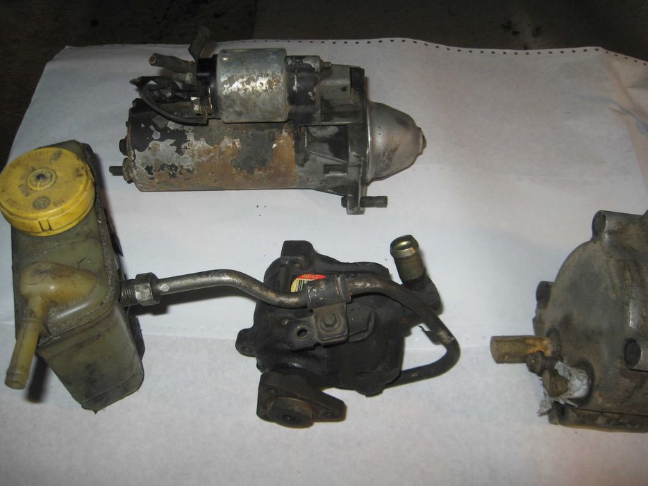 Piese Ford Escort 1,8TD '99 electromotor aer AC Ppa frana radiator etc