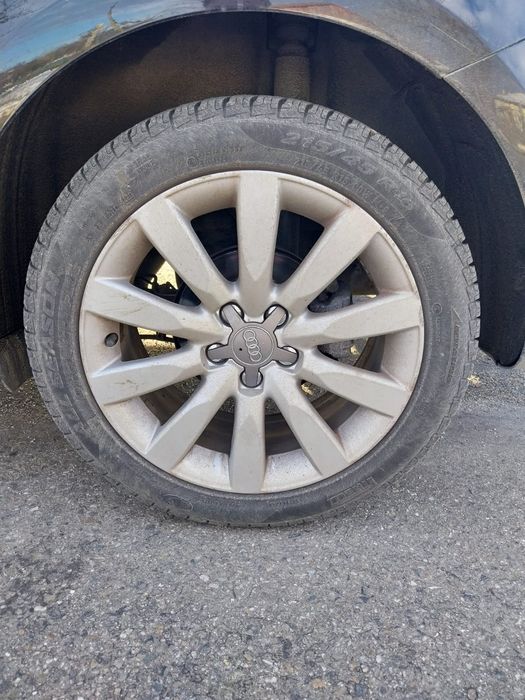 Jante R16 5x100 Originale Audi A1 + 215/45 R16 Allseason Continental