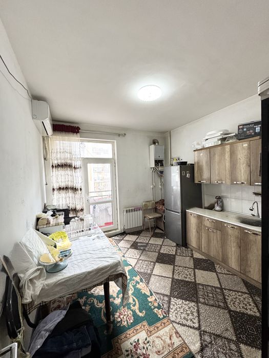 Продается 4 комнатная квартира.Мирзо Улугбекский район.Массив Карасу-6