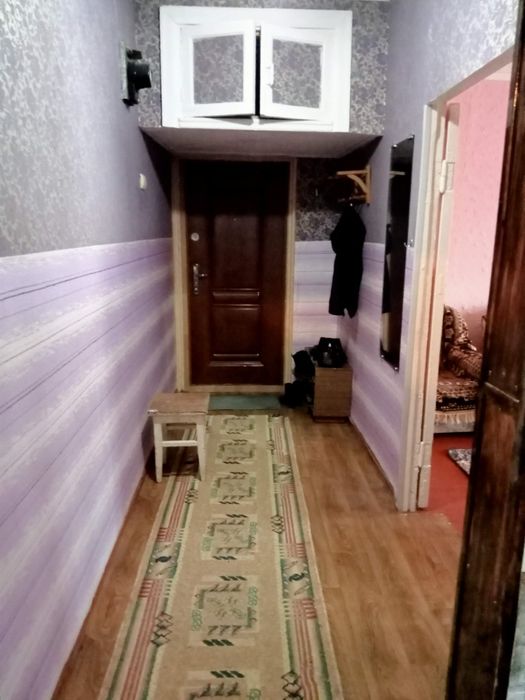 Квартира в деревянном доме