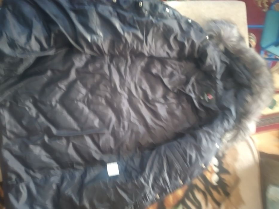Продам зимний  пуховик