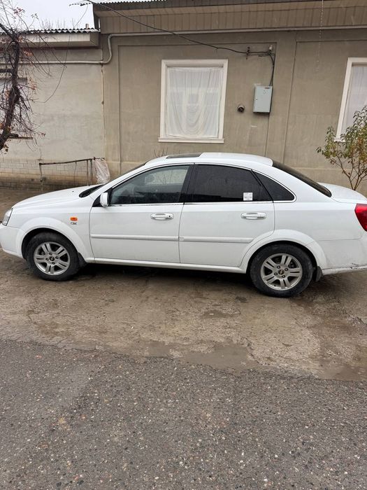 Lacetti 1.8 A/T 2009 gaz bor 100 talik