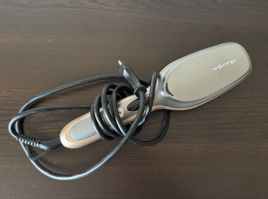 Изправяща четка за коса