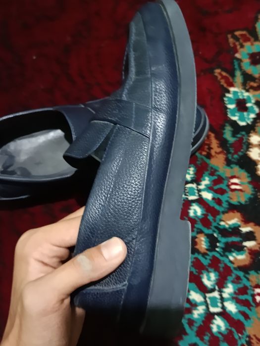 Tufli charmdan holati yangi