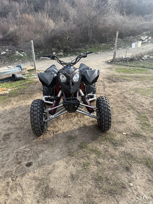 Атв polaris outlaw 525