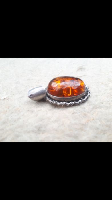 Серебряный кулон.