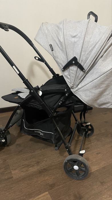 Продам коляску б/у и детский стульчик+ходунок