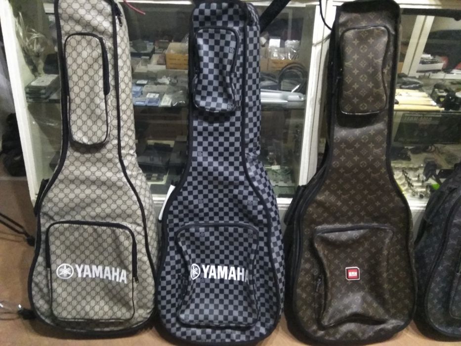 Elektro va Akustika gitara chexollari sotiladi