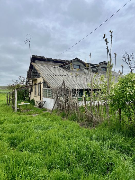 Teren intravilan 6576 mp, comuna Curcani si casa caramida