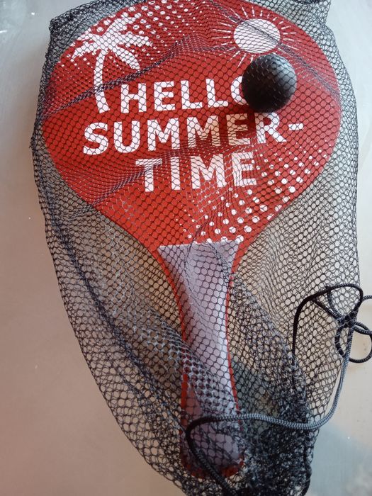 Хилка с топче за плажен тенис