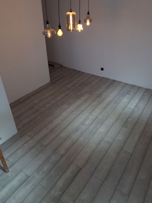 Укладка ламината,линолеума.