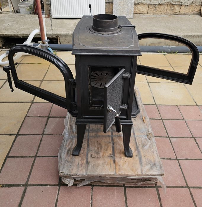 Чугунена камина - двулицева