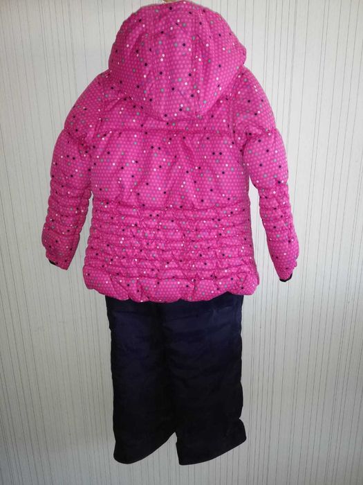 Продам зимний комбинезон для девочки