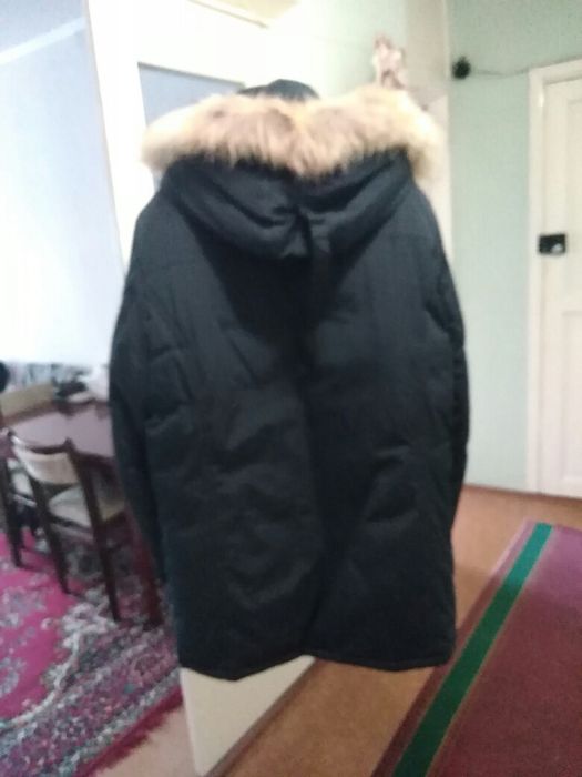 Продам зимний пуховик