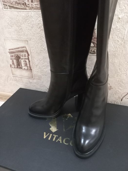 Продам новые кожаные сапоги