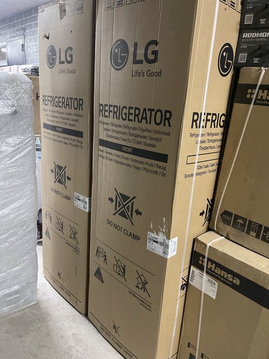 Новый холодильник в коробке