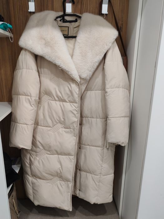 Пуховики женские