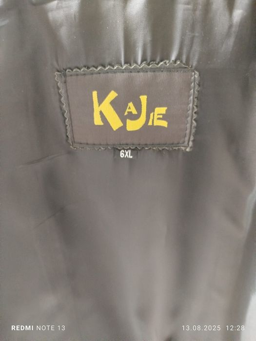 Продам кожаный плащь женский