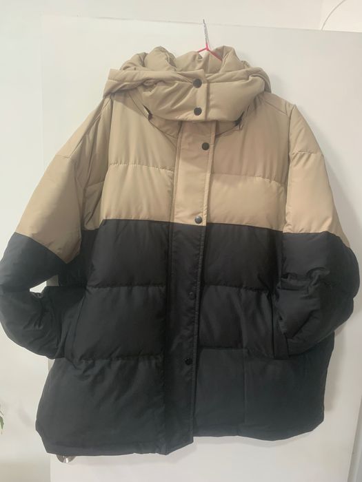 Женский пуховик. Производство Китай.