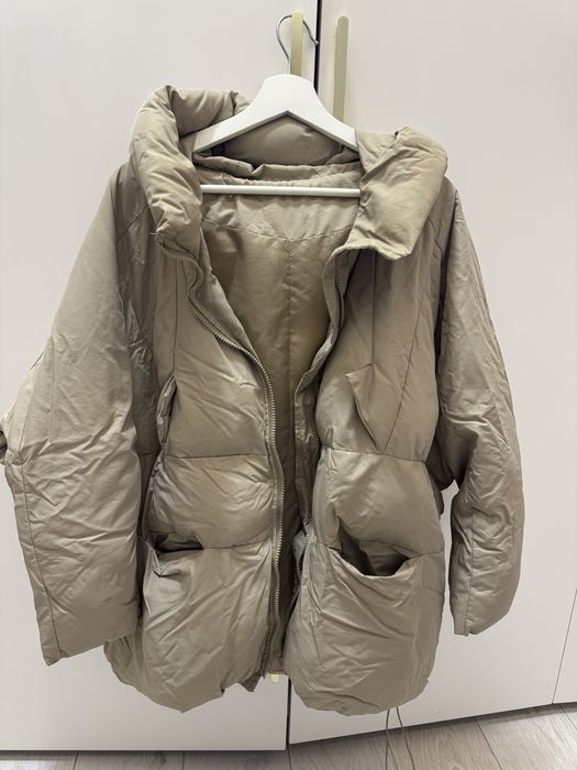 Продам бежевый пуховик