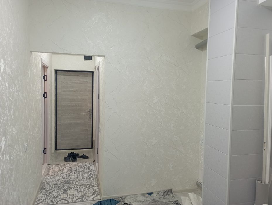 Yangi dom zamonaviy qurilgan Tinchlik plaza mehmonxonasi yonida