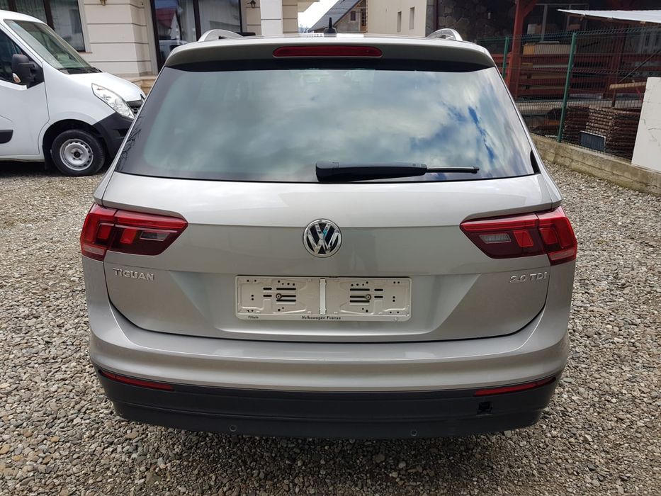 Piese Volkswagen Tiguan, caroserie,aripa,stopuri,oglinda,prag,bandouri